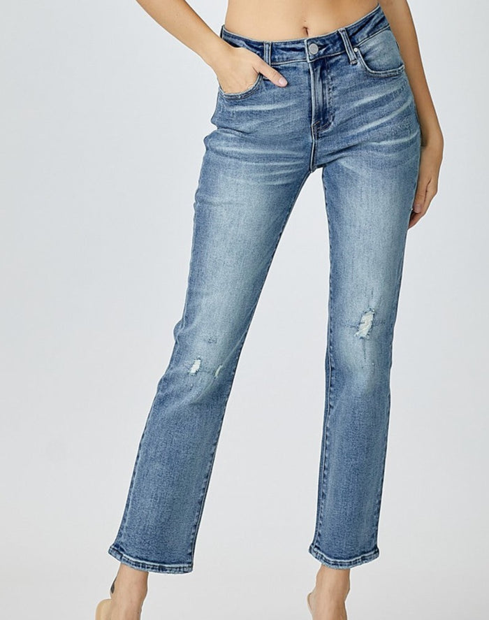 model wearing slim straight leg jeans